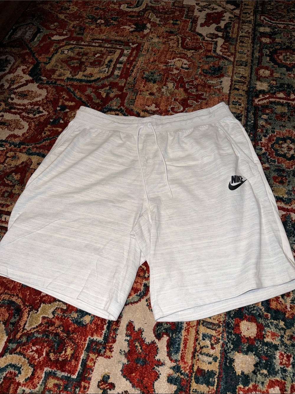Nike Men's Light Heather Gray Athletic Shorts with Black Swoosh